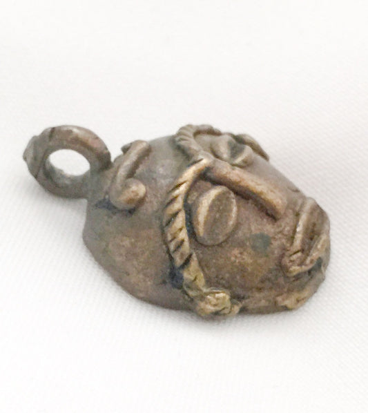 Vintage Primitive Ancient Face Pendant from the 1940's