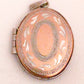 Locket with Oval Decorative Design and Oval Shape