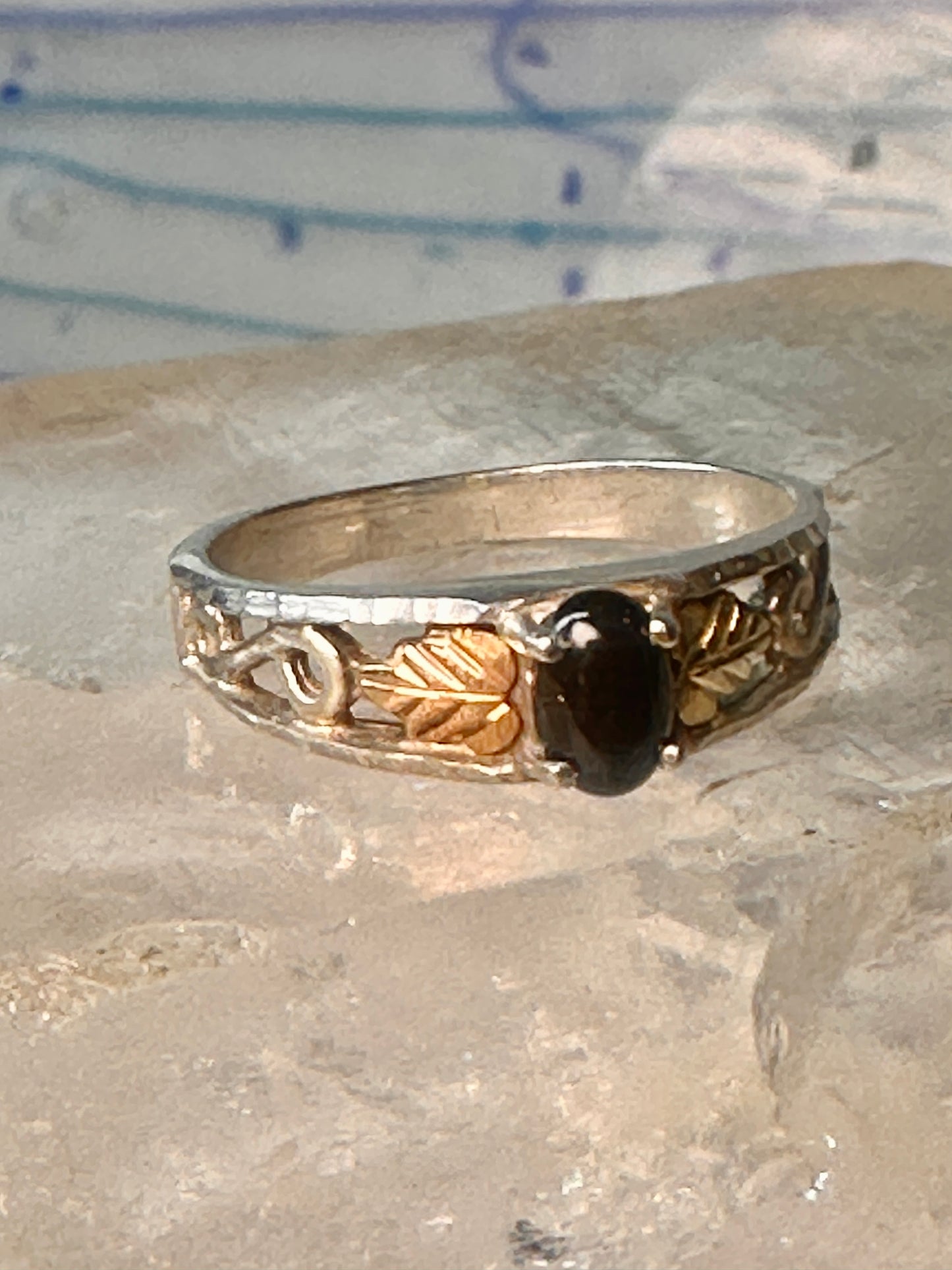 Black Hills Gold ring onyx band size 7.75 leaves sterling silver women