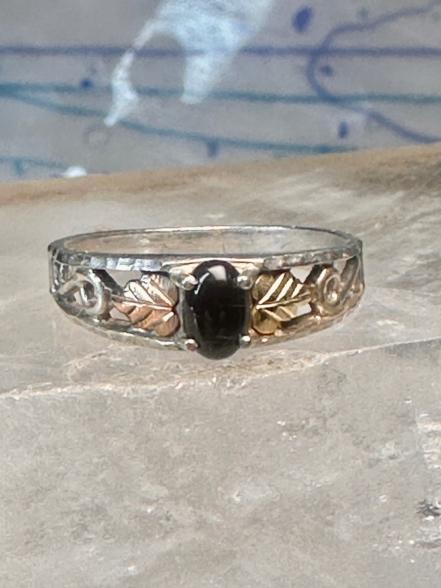 Black Hills Gold ring onyx band size 7.75 leaves sterling silver women