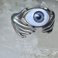 Hands holding an Eye ring pinky band size 5.50 sterling silver women