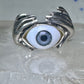 Hands holding an Eye ring pinky band size 5.50 sterling silver women
