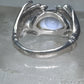 Hands holding an Eye ring pinky band size 5.50 sterling silver women