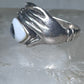 Hands holding an Eye ring pinky band size 5.50 sterling silver women