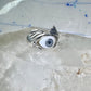 Hands holding an Eye ring pinky band size 5.50 sterling silver women