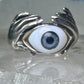 Hands holding an Eye ring pinky band size 5.50 sterling silver women