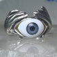 Hands holding an Eye ring pinky band size 5.50 sterling silver women