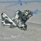Male Ring figure holding a stone Good Luck size 8.75 sterling silver women