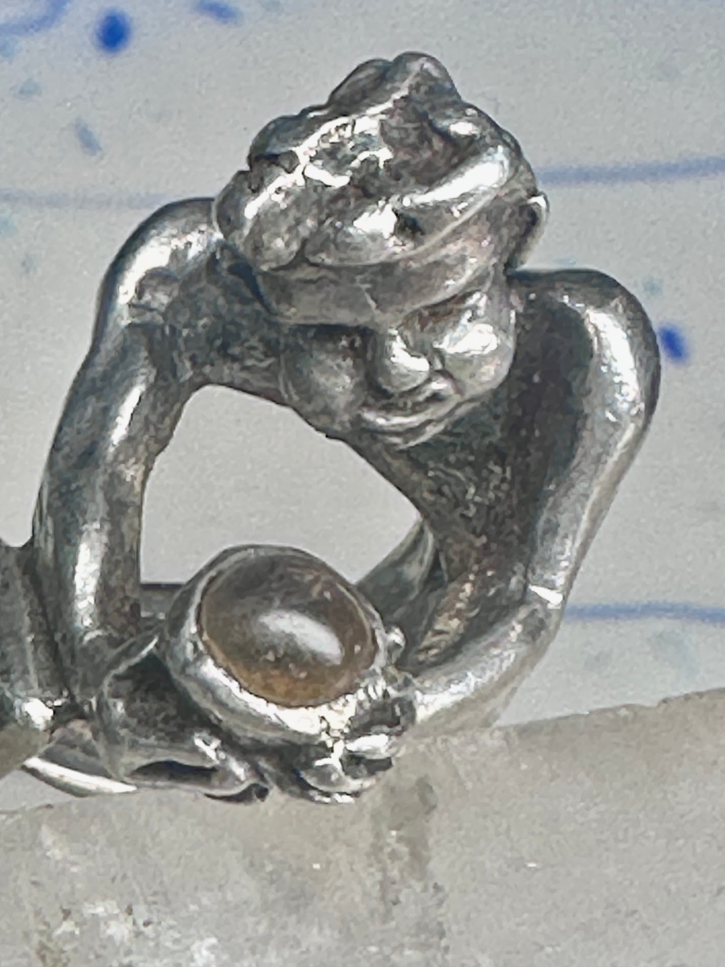 Male Ring figure holding a stone Good Luck size 8.75 sterling silver women