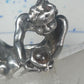 Male Ring figure holding a stone Good Luck size 8.75 sterling silver women
