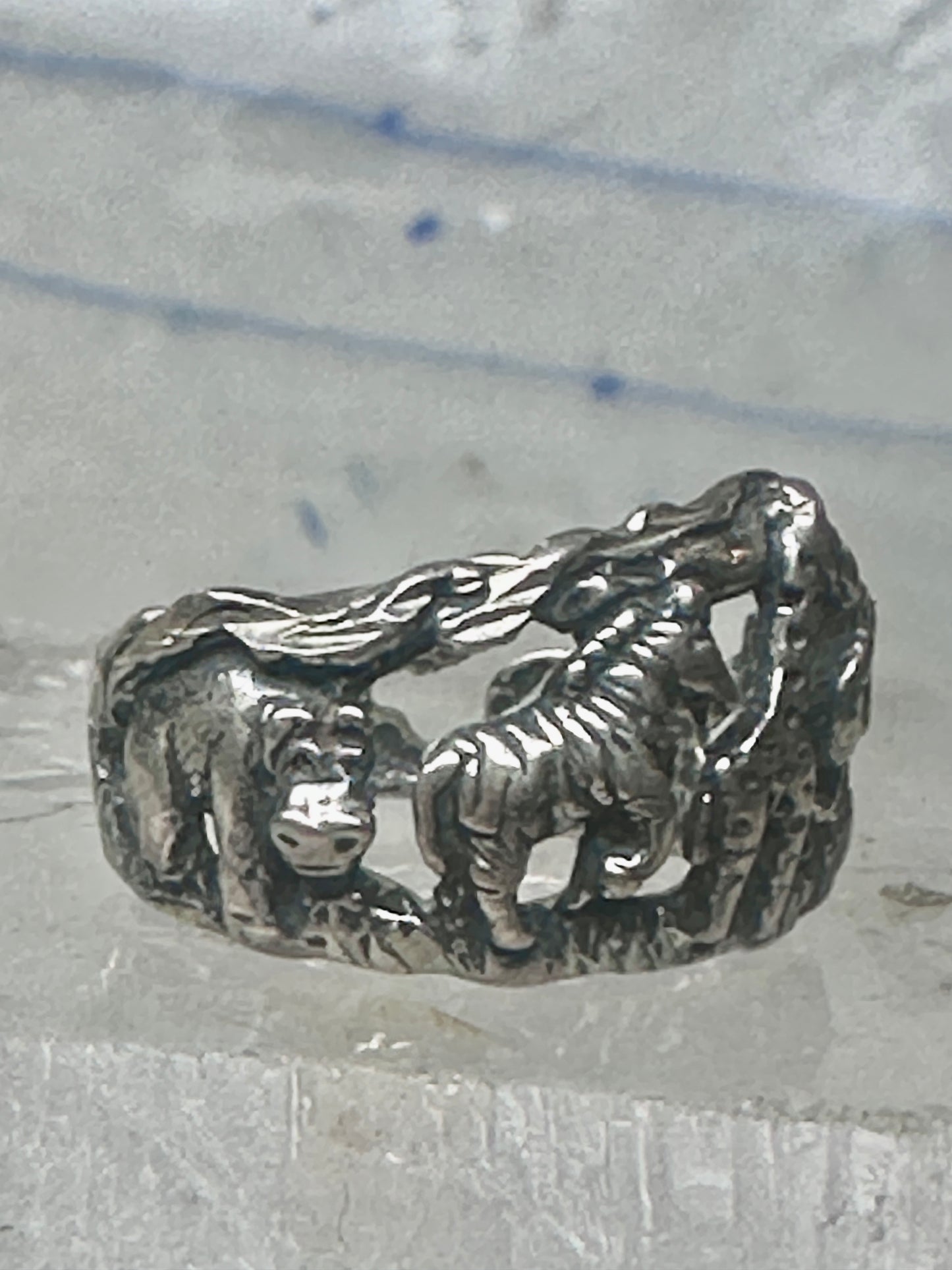 Animal ring Ted Ott Navajo size 5.5 Safari elephant giraffe horse zebra? hippo tiger sterling