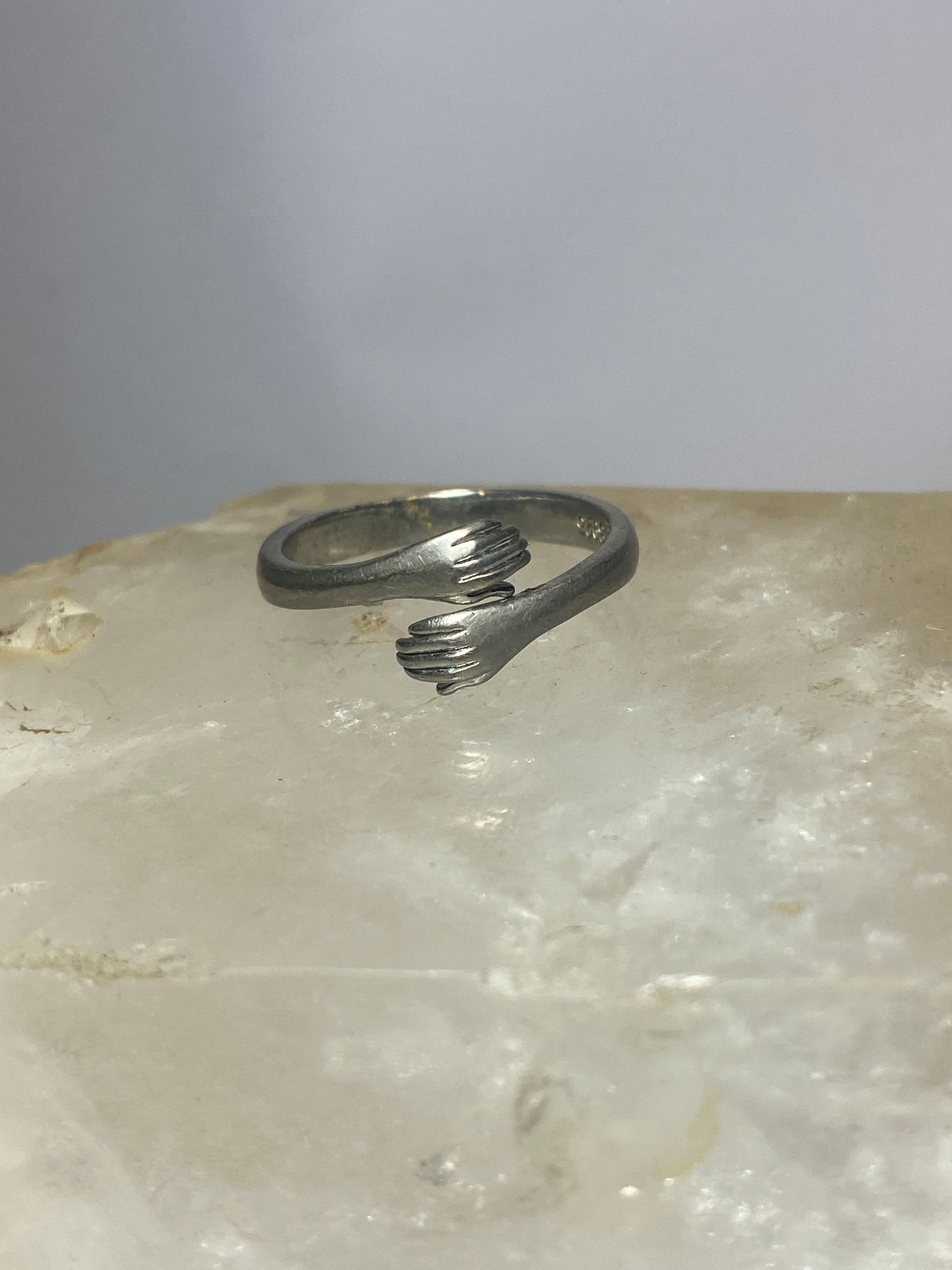 Hands ring bypass band  size 7 adjustable  sterling silver women