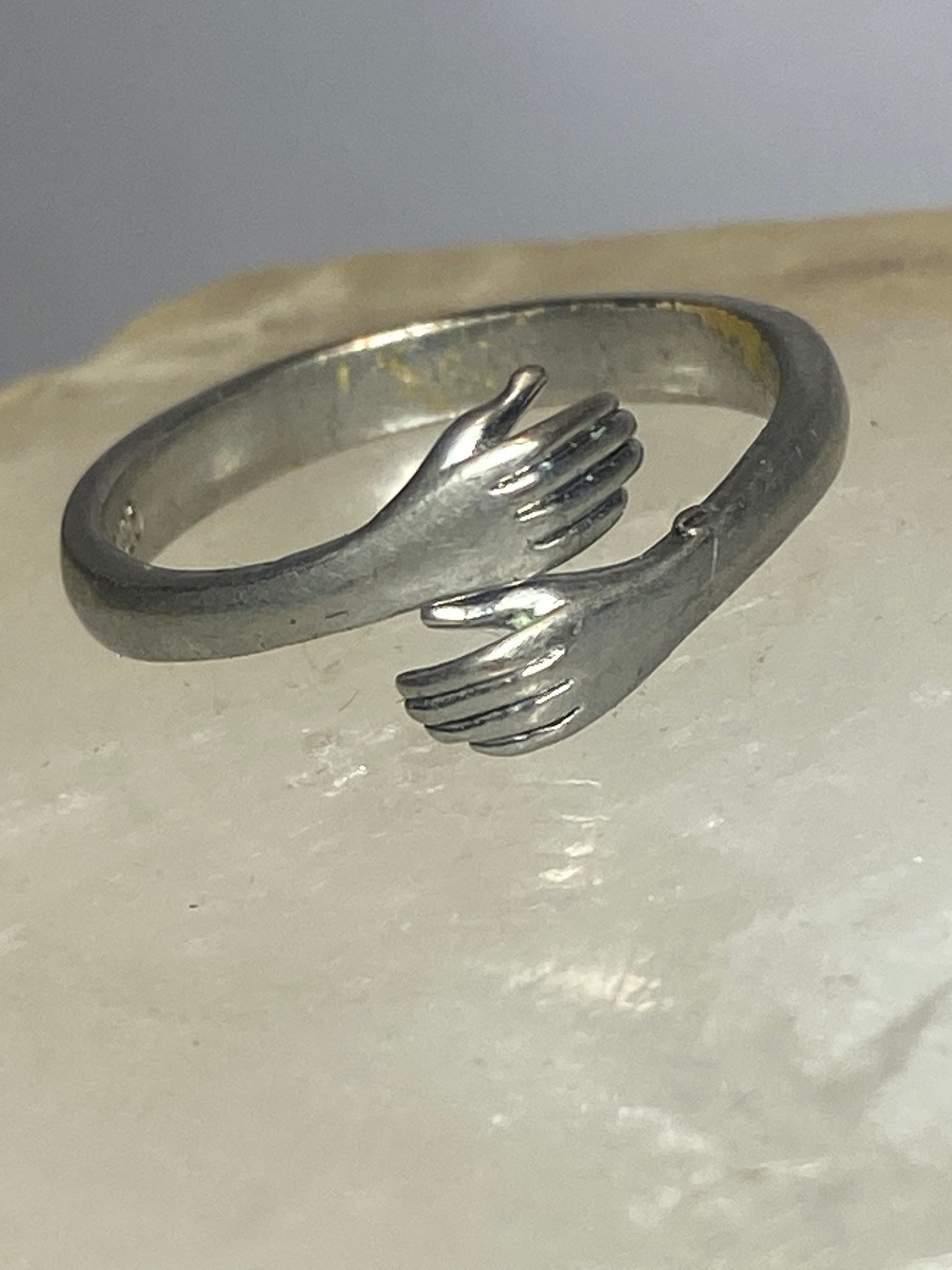 Hands ring bypass band  size 7 adjustable  sterling silver women