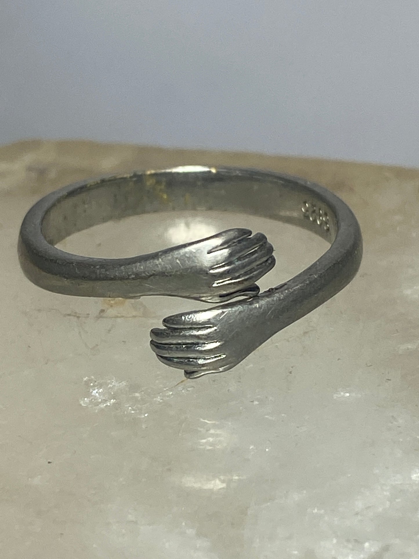 Hands ring bypass band  size 7 adjustable  sterling silver women