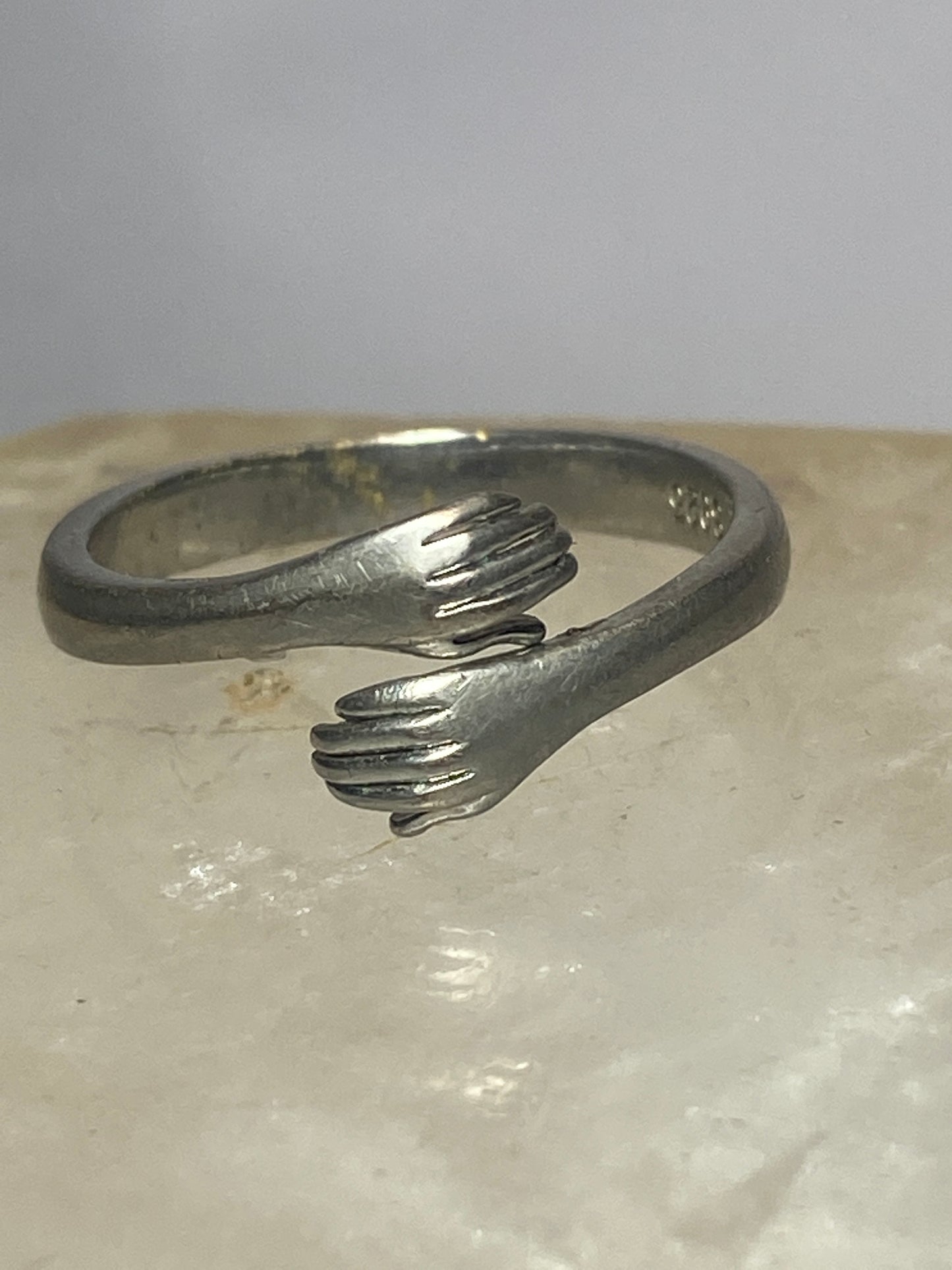 Hands ring bypass band  size 7 adjustable  sterling silver women