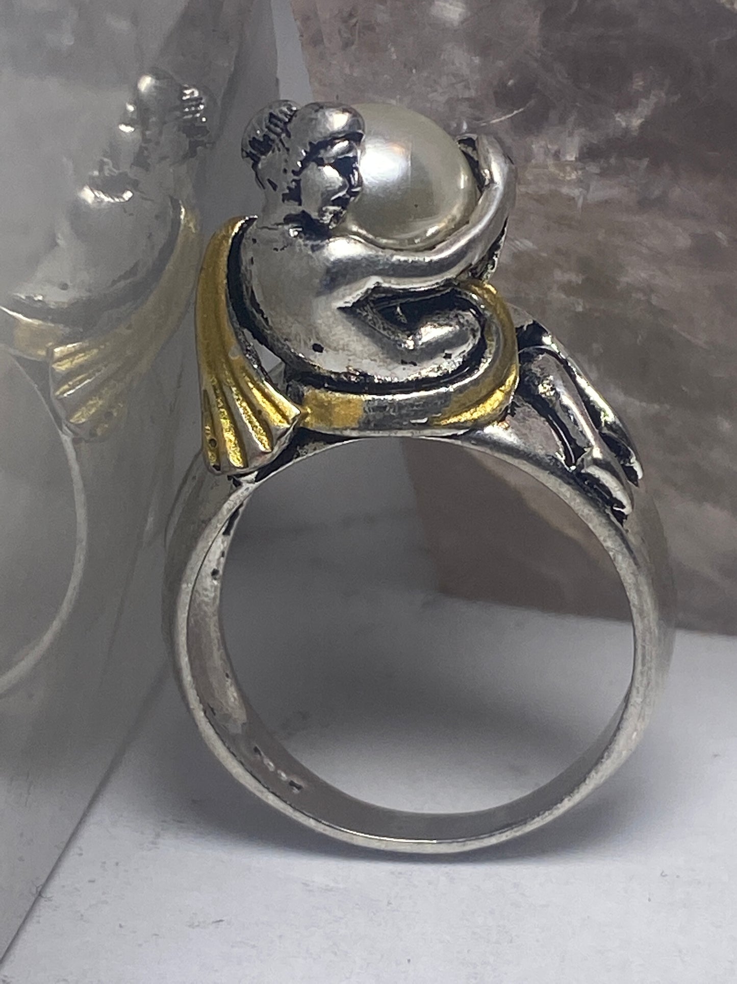 Naked lady ring holding pearl band  sterling silver women