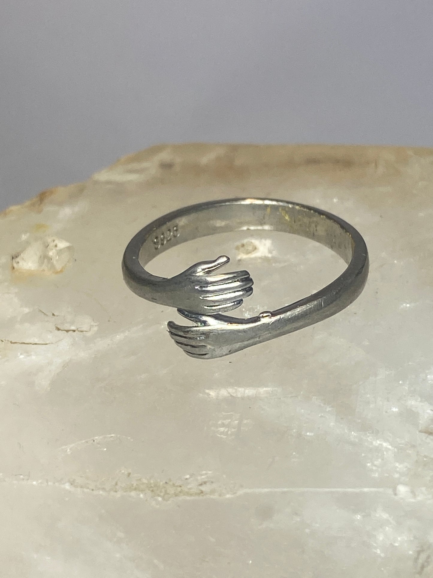 Hands ring bypass band  size 7 adjustable  sterling silver women