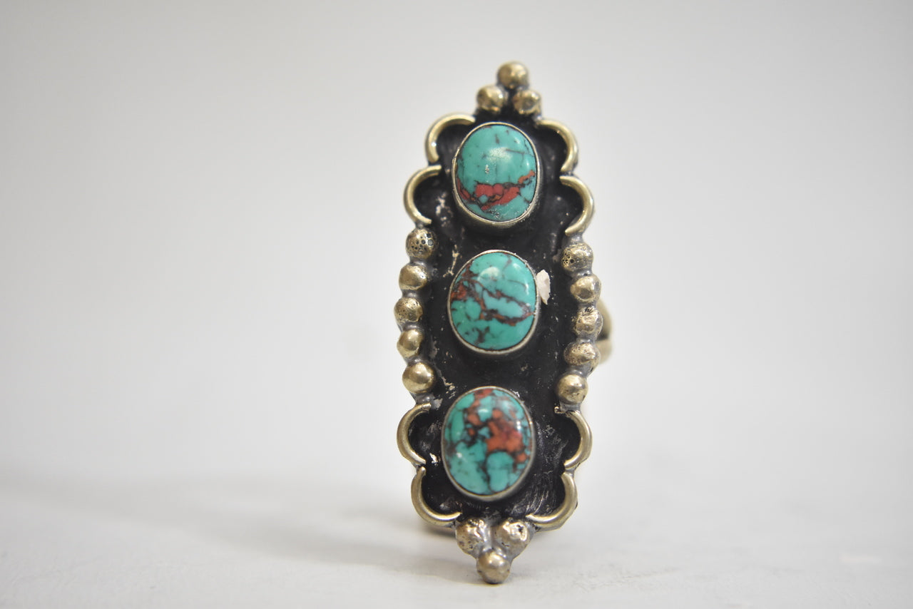 Long Turquoise ring Navajo Sterling Silver Turquoise red accents Size 7.25