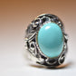 Turquoise ring Navajo leaves feathers southwest women sterling silver