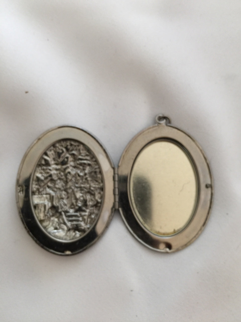 Vintage Locket with a Scene reflecting Life in the Middle Ages